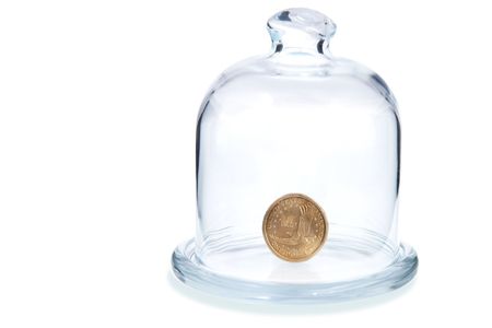 Transparent money. Transparent glass-bell over coin dollarsの写真素材