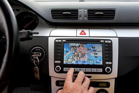 Car dashboard with gps panel, travel and technology background