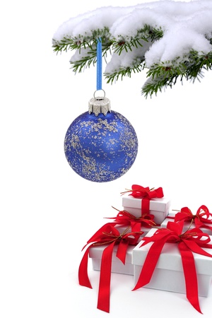 Christmas  tree over gift with red ribbonの写真素材
