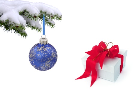 Christmas  tree over gift with red ribbonの写真素材