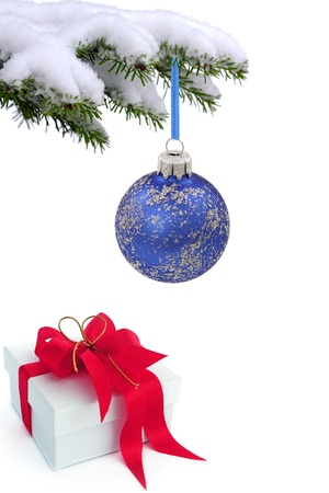 Christmas  tree over gift with red ribbonの写真素材