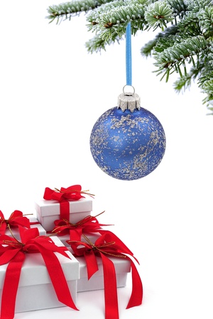 Christmas  tree over gift with red ribbonの写真素材