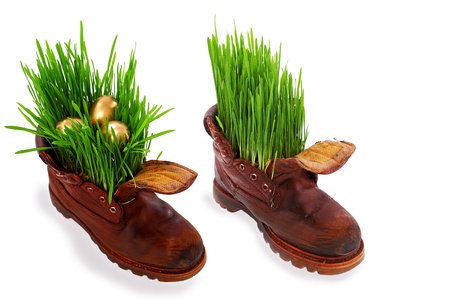 Easter and spring comes everywhere, even in the old soldier s boot の写真素材