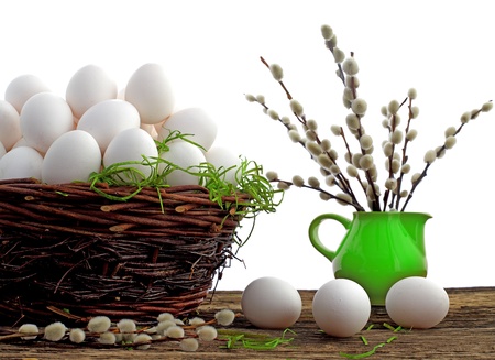 Easter eggs and  natural wooden country table, background and textureの写真素材