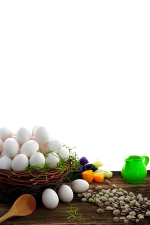 Easter eggs and  natural wooden country table, background and textureの写真素材