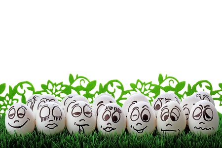 White easter eggs and funny facesの写真素材