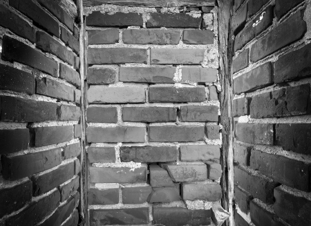 Great background in old brick empty small roomの写真素材