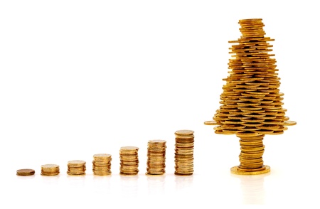 Happy Christmas tree made of golden coins, business metaphor の写真素材