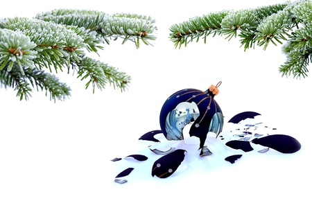  Christmas tree and broken glass bauble on white, failed christmasの写真素材