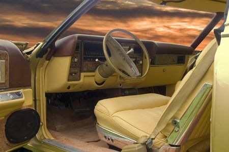 Sunset view through the windshield of the old American carの写真素材