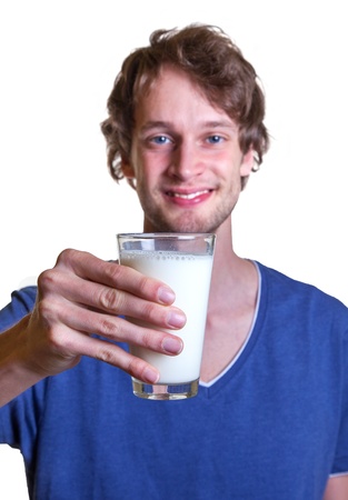 Young Man showing fresh milkの写真素材