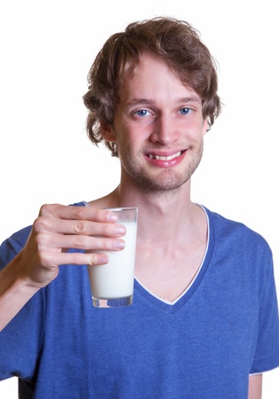 Young man drinking milkの写真素材