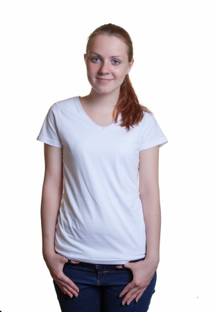 Standing young girl in white shirtの写真素材