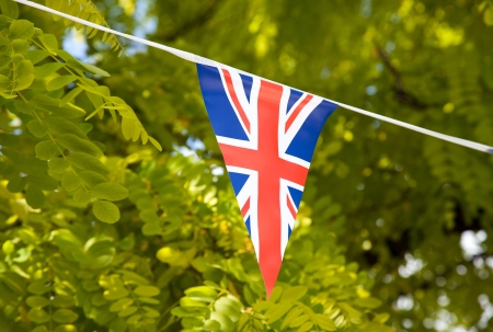 Flag of Great Britain with trees in the backgroundの写真素材
