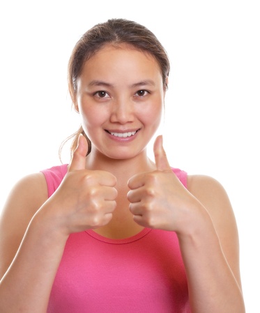 Asian girl showing both thumbsの販売画像