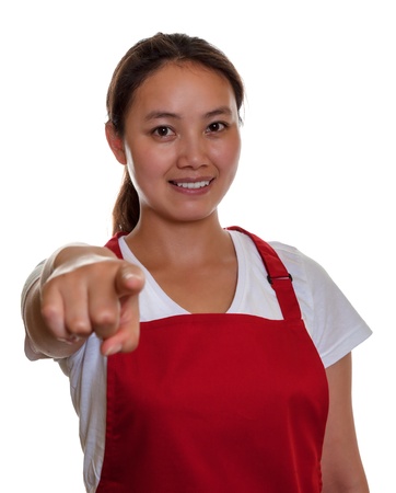 Friendly chinese waitress pointing to youの写真素材