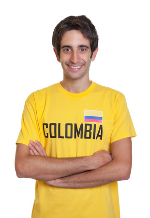 Laughing guy from Colombia with crossed arms looking at cameraの写真素材