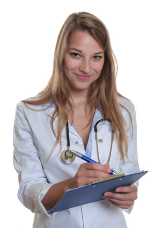 Female doctor with blond hair and clipboardの写真素材