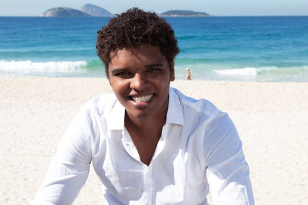 Man from Rio de Janeiro with beach and oceanの写真素材