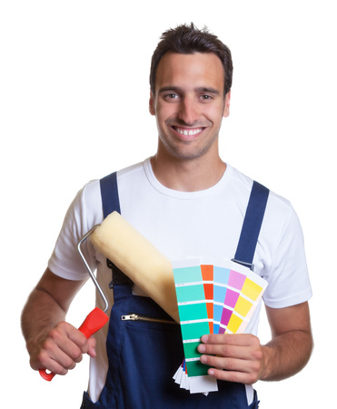 Happy painter with painting roller and coloursの写真素材
