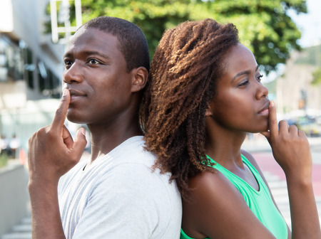 Thinking african american couple in the cityの写真素材