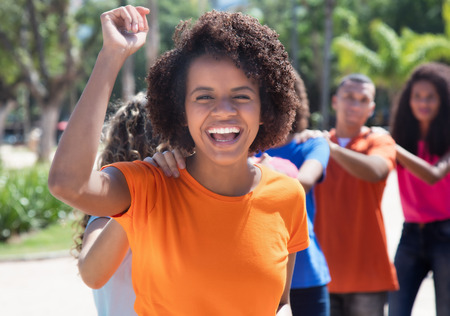 Group of brazilian young adults celebrating carnival