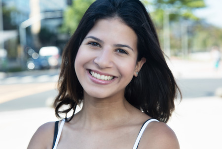 Beautiful caucasian woman in the city in the summerの写真素材