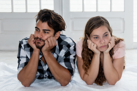 Latin american has problems with caucasian girlfriendの写真素材