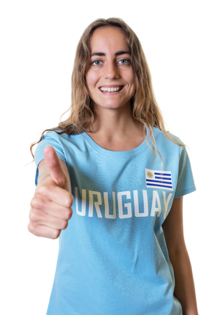 Laughing sports fan from Uruguay showing thumb upの写真素材
