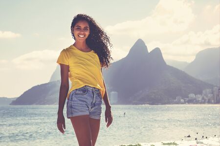 Laughing brazilian girl at Ipanema beach at Rio de Janeiroの写真素材
