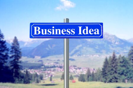Business idea on blue street sign with landscapeの写真素材