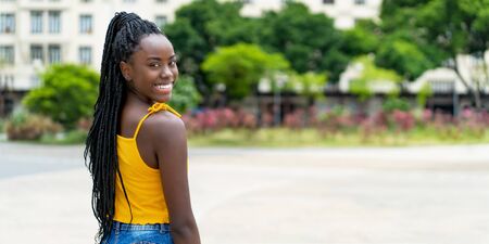 African american woman with dreadlocks and copy space