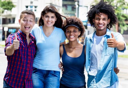 Group photo of hispanic and caucasian and african american young adultsの写真素材
