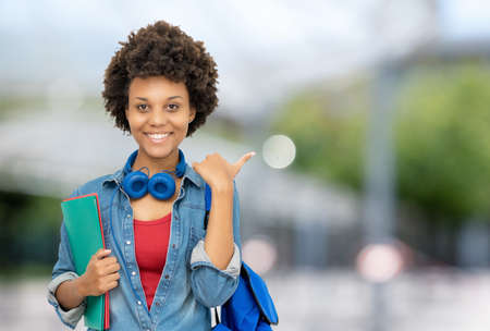 Cheering african american female university student