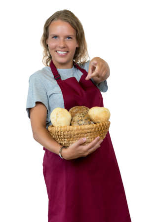 Pretty blond woman with bread rolls from the bakeryの写真素材
