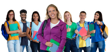 German young adult woman with large group of international students