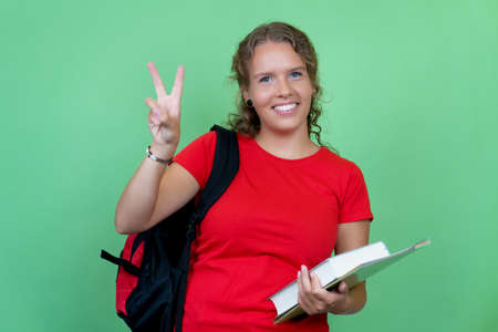 Pretty german female student with red shirtの写真素材