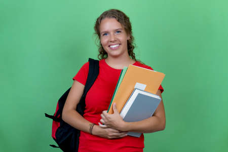 Laughing german female student with red shirtの写真素材