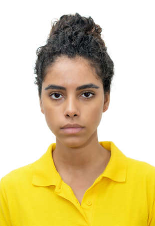 Passport photo of serious mexican female young adultの写真素材