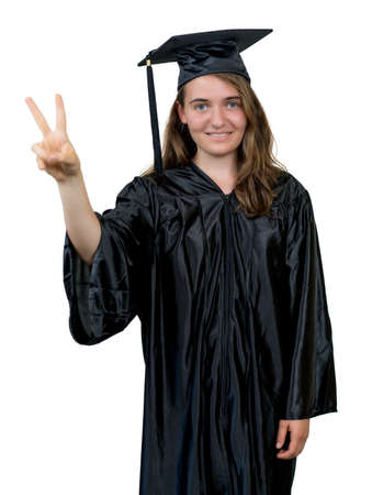 Happy female graduate student with academic dress and capの写真素材