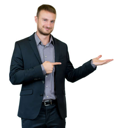 British businessman with suit poiting sidewaysの写真素材