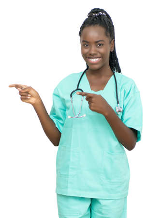 Afro american female nurse pointing sidewaysの写真素材
