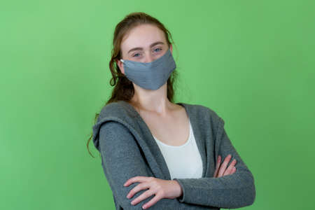 French woman wearing face mask as protection against coronavirus infectionの写真素材