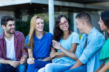 Group of international young adults talking about politicsの写真素材