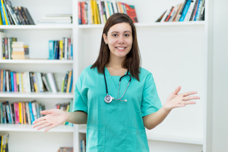 Beautiful american female nurse at hospitalの写真素材
