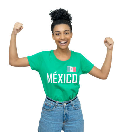 Cheering mexican young adult woman with football shirtの写真素材