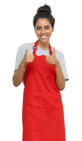 Pretty mexican waitress or female clerk showing thumbs up isolated on white background for cut outの写真素材