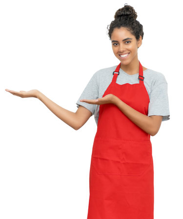 Young mexican waitress or female clerk presenting offer for sale isolated on white background for cut outの写真素材