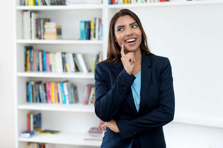 Dreaming mexican female business traineeの写真素材