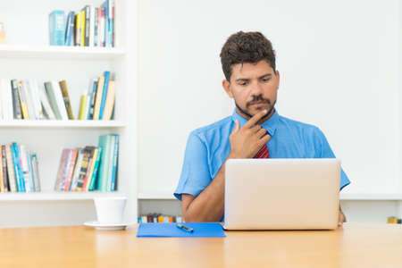 Hispanic businessman at video callの写真素材